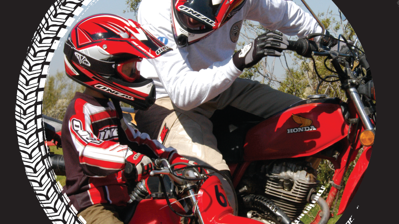 Man and child on motorcycles