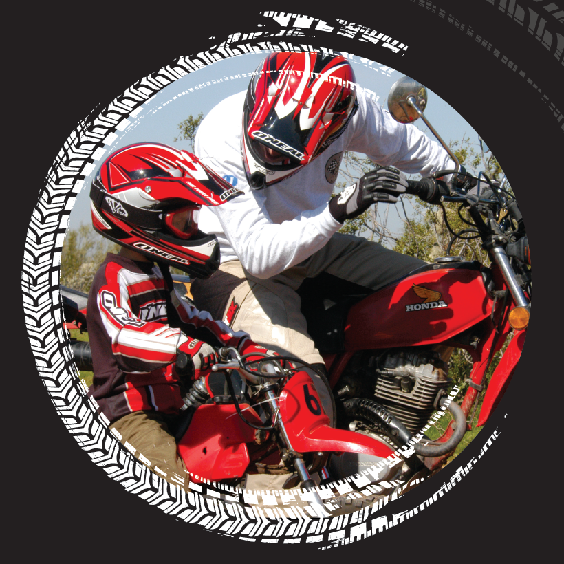 Man and child on motorcycles